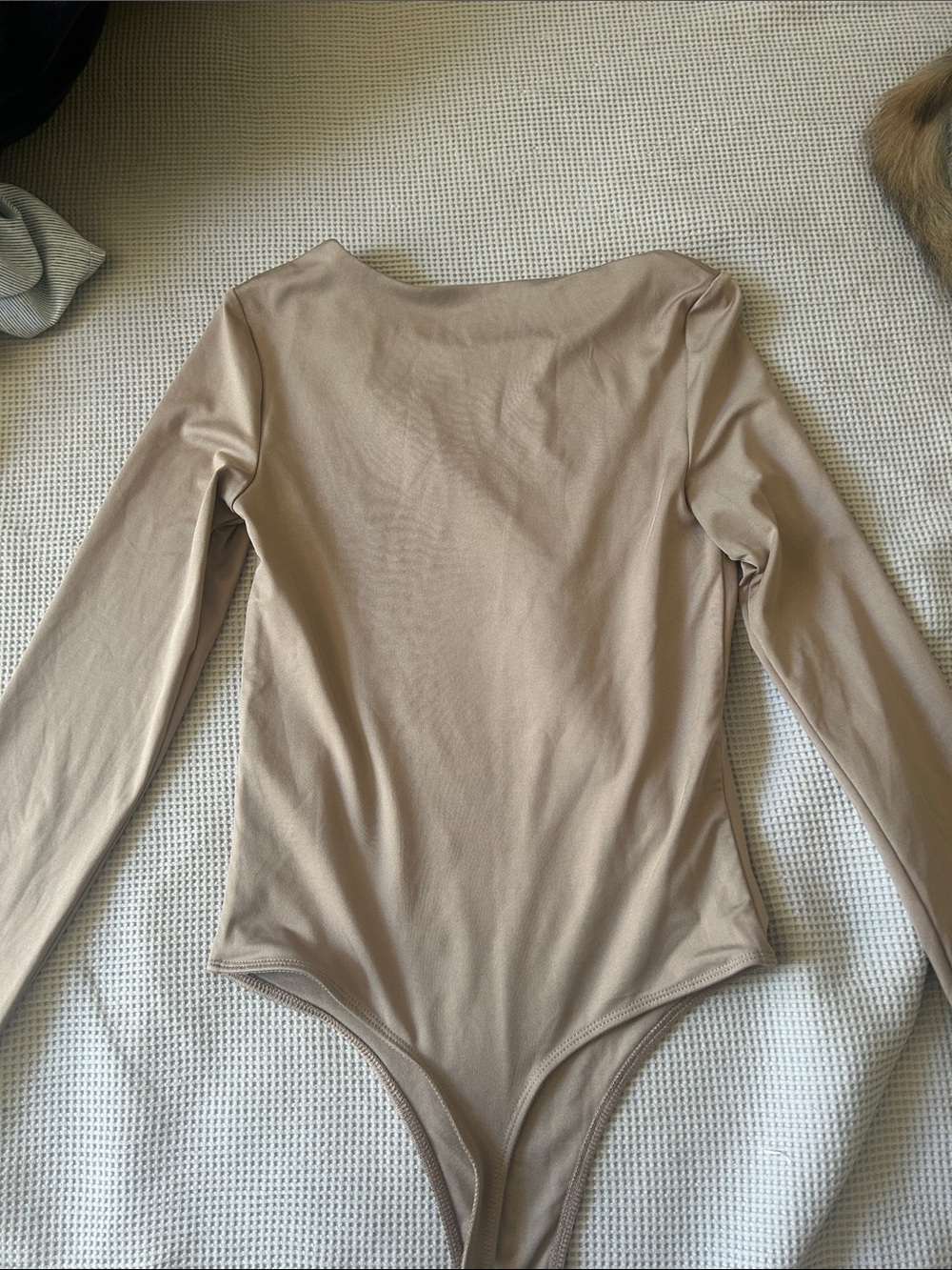 Woman’s Long-Sleeve One-Piece Bodysuit in Taupe